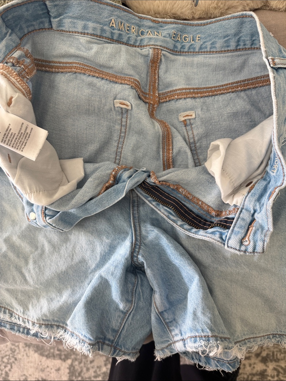 American Eagle Outfitters Light Blue Denim Shorts with Tan Stitching